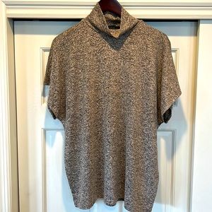 Joan Vass tan and black mock turtle neck top with extended shoulder sleeve